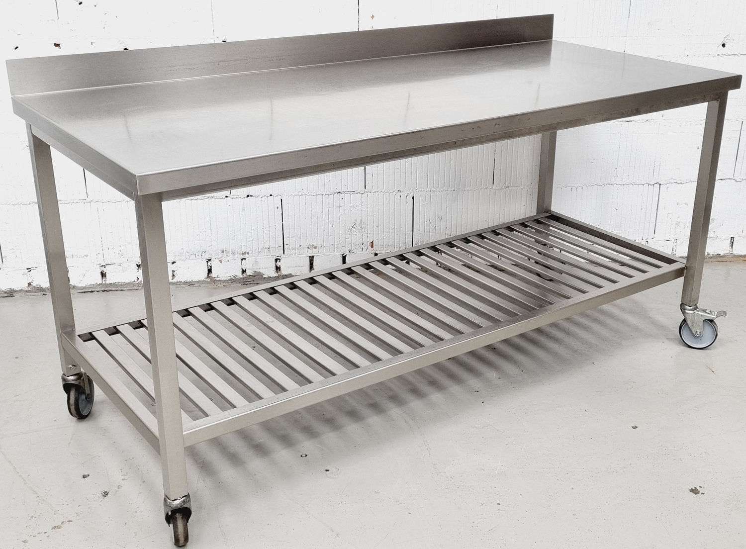 Arbeitstisch AT 1880 mit Edelstahlplatte fahrbar