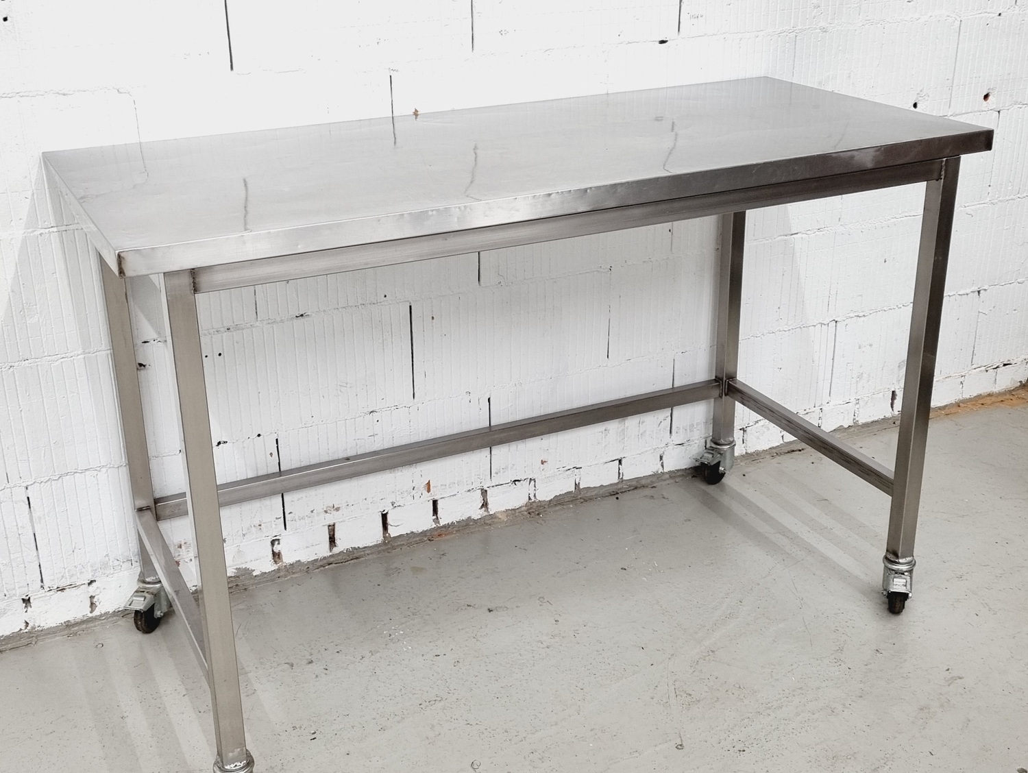 Arbeitstisch AT 1600 mit Edelstahlplatte fahrbar